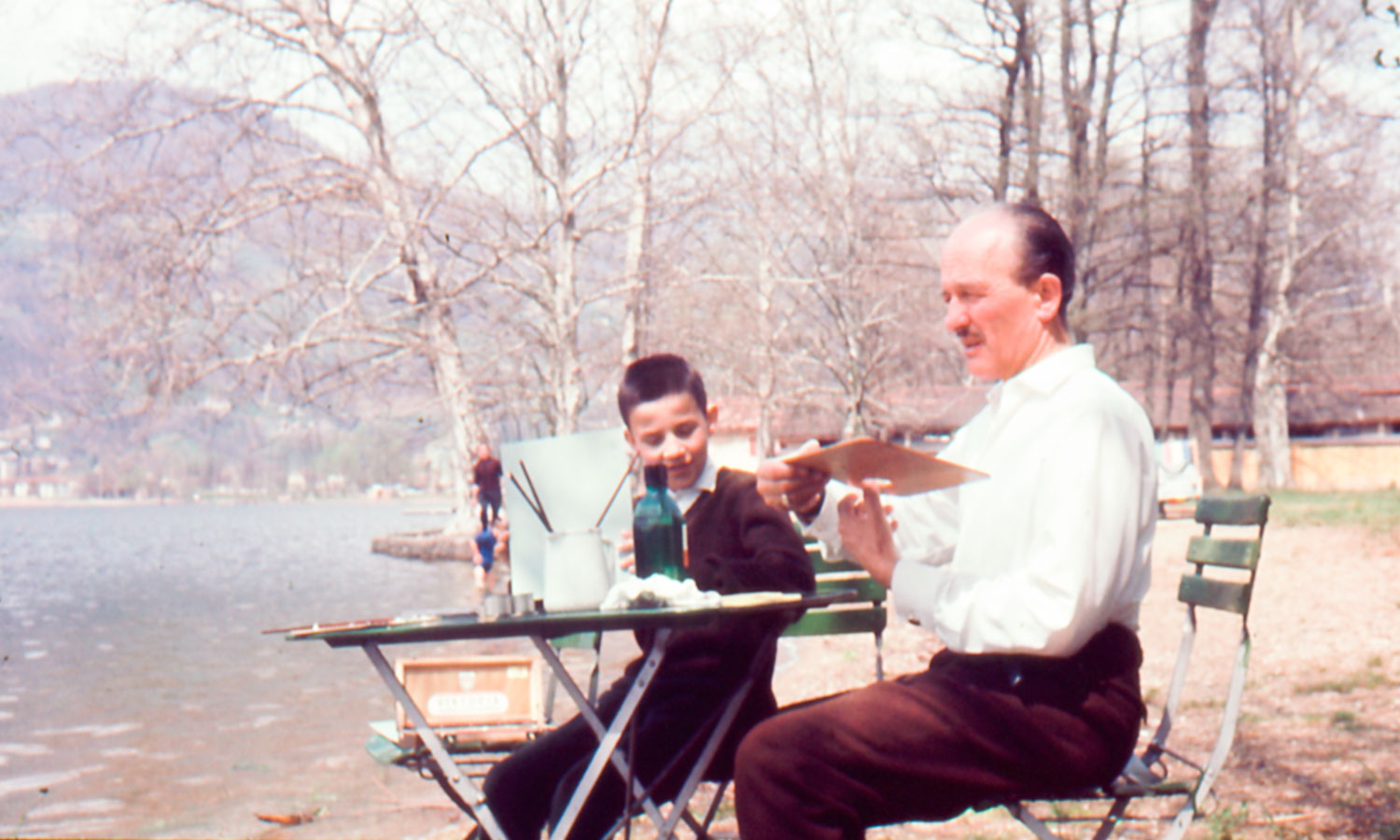 Wilhelm Walter at the table with his son